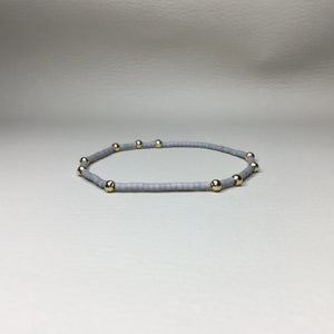 matte grey with gold brass accent beads