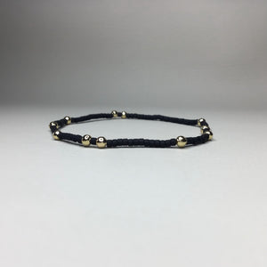 matte black with gold brass accent beads 
