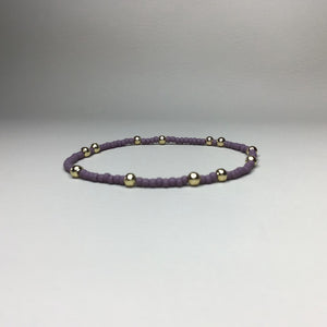 matte mauve with gold brass accent beads 