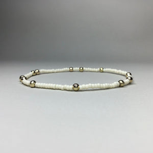 ivory with gold brass accent beads 