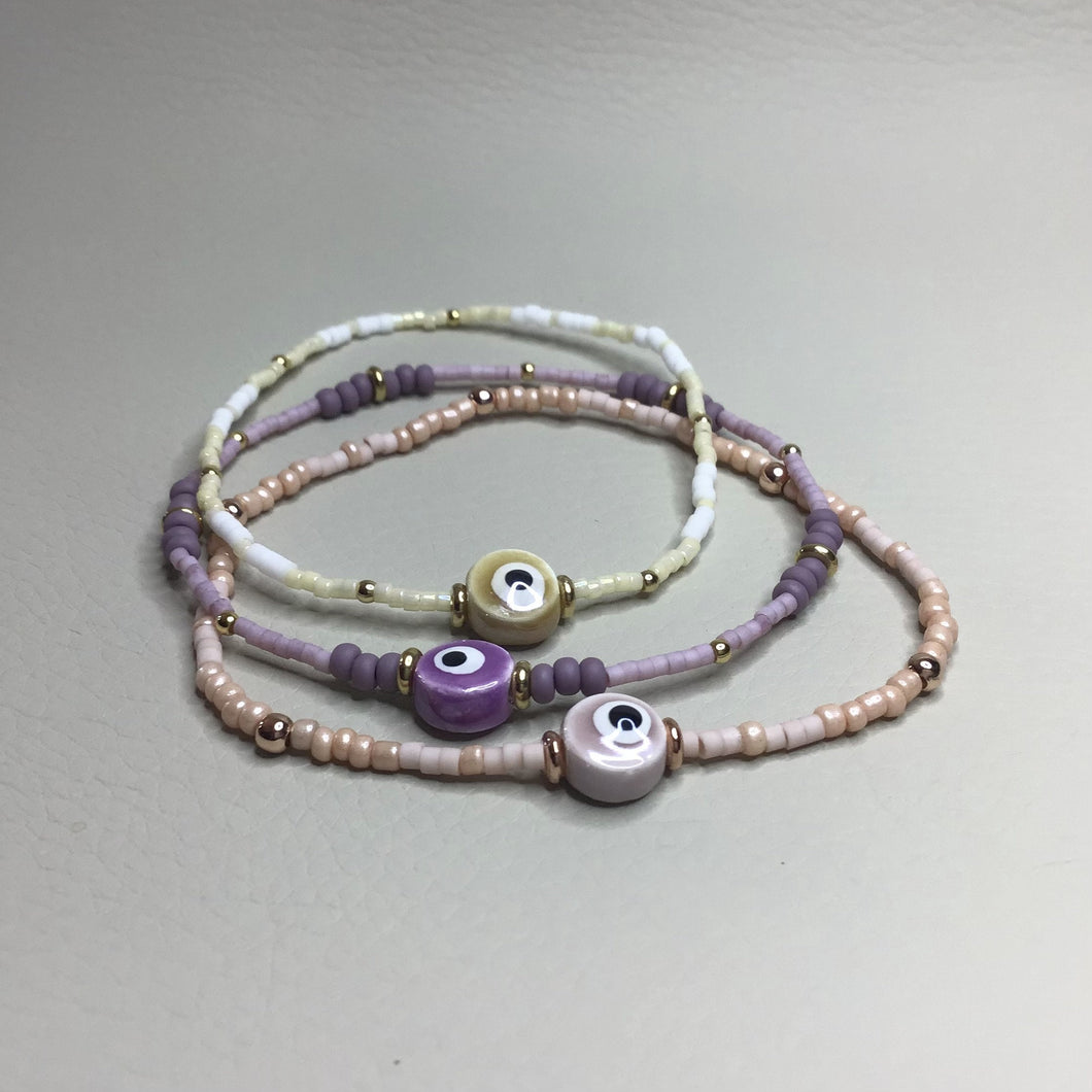 Bracelets | Charms | Evil Eye | Protection Bracelet | Seed Beads | Peach | Purple | Cream | Handmade | Beaded Bracelets | Stretch Bracelet